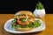 chicken patty sandwich with sauteed peppers and onion