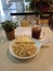 Chicken Pesto Pasta with bread and Iced Tea.