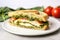 chicken pesto sandwich on a white plate, no garnish