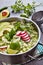 Chicken Pozole Verde in a metal casserole