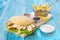 Chicken Round Sandwich with Fries and Cheese, Sandwich with Crispy Fried Chicken Breast in Round Bread, Green Lettuce, Potato