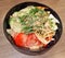 Chicken Salad served with tomatoes, seaweed, cucumber and mentai sauce