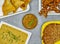 chicken samosa, vegetable pakora, haleem, sada chany and qeemay wala naan iftar food table top view
