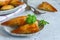 Chicken samosas with almond and apricot