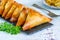 Chicken samosas with almond and apricot