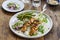 Chicken satay and cucumber salad, rice and green beans