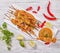 Chicken satay on skewers with sauce