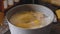 Chicken simmering in a pot. Broth is boiling in a stock pot, health food