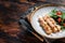 Chicken skewers souvlaki, grilled meat shish kebab skewers. Wooden background. Top view. Copy space