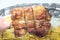 Chicken skewers stuffed with baked bacon-