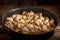 Chicken slices being friend in a pan on a wooden background