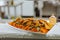 Chicken snacks and carrot on distribution desk in restaurant