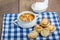 Chicken soup and biscuits on table