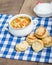 Chicken soup and biscuits on table