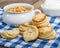 Chicken soup and biscuits on table