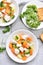 Chicken soup with carrot, broccoli, potato, top view