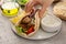 Chicken souvlaki with fresh vegetables on a flatbread