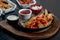 Chicken steak fajita with sauces on table stock photo