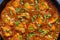 Chicken tikka masala close up texture, traditional spicy meat food