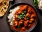 Chicken Tikka Masala dish with rise