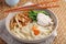 Chicken and udon noodle soup with Shimeji mushrooms