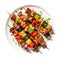 Chicken And Vegetable Kabobs On White Plate On A White Background