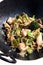 Chicken vegetable stir-fry in a wok