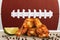 Chicken wings with football ball image in background.