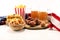 Chicken wings, fries and onion rings for football on a table. Great for Bowl Game