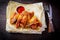 Chicken wings. Grill dishes for the restaurant menu. Wooden background. Top view