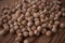 Chickpea grains on wooden background