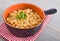 Chickpea soup in terracotta bowl.