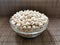 Chickpeas are nutritious foods. Healthy and vegetarian food. Chickpeas in a glass bowl on a brown mat.