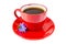 Chicory drink in red cup with blue flower