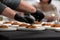 chief serving herring with potato Kroket croquette Dutchs favourite snack deep-fried ragout filled snack coated with