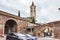 The Chiesa di San Procolo church side wall and Basilica di San Zeno Maggiore bell tower in old part of Verona, Italy