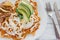 Chilaquiles rojos with chicken and avocado mexican food mexico breakfast