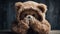 Child abuse concept. Teddy bear covering eyes