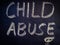 Child Abuse word written on english language with eye shape diagram