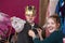 Child actor dressed as king wearing crown