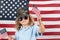 Child with american flag, independence day 4th of july. United States of America concept. Fourth of july independence