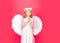 Child angel prayer. Child with angelic character. Toddler girl wearing angel costume white dress and feather wings