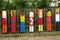 Child art displayed on wooden fence