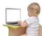 Child baby girl toddler typing on modern computer laptop keyboard