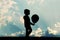 Child with balloon silhouette