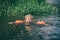 A child bathes in a summer river