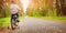 A child on a bicycle in helmet