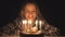 Child Birthday Party Blowing Candles in Night, Kid Celebrate with Cake in Dark