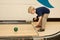 Child bowling with ball