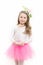 Child with box in pink skirt tutu on white